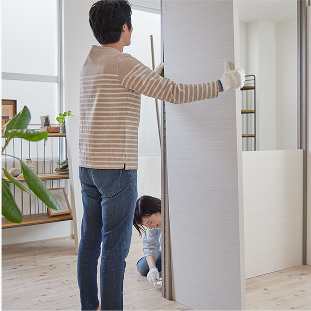 反対側の袖パネルを固定する